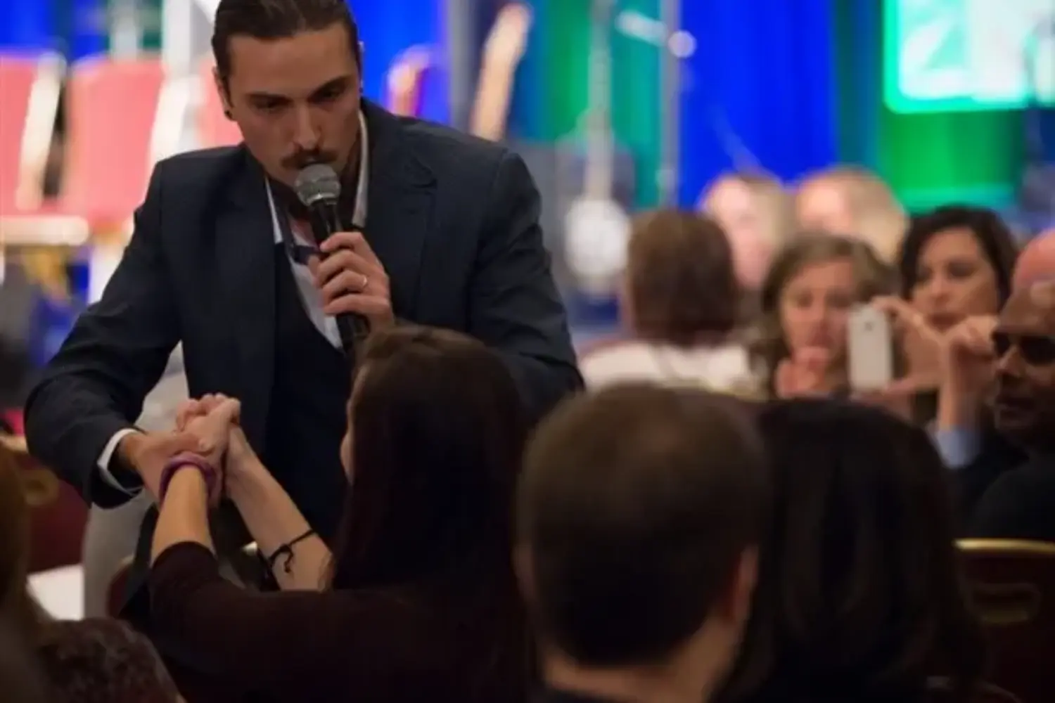 “Hank Stone's corporate comedy hypnosis show exceeded all expectations, distinguishing itself significantly from the one I witnessed during my university days. It delivered a notably sophisticated and customized performance that was an ideal fit for our corporate event, characterized by Hank's profound respect for his volunteers. He refrained from any form of rudeness, embarrassment, or intrusive inquiries, instead elevating his volunteers as the true stars of the show. What left the most lasting impression was Hank's unparalleled gift and his extraordinary talent of on-the-spot improvisational skills, which were truly exceptional. He effortlessly cultivated a clean, tasteful, and highly engaging comedic atmosphere that not only made our event special and memorable but also promoted teamwork and left everyone in sheer amazement. Hank Stone's performance was an absolute masterpiece. We eagerly anticipate his return. Exceptional job, Hank!” - Brenda